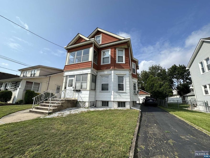 Must see! Multi family property in Totowa Section! Total of 10 rooms, 4 bedrooms, 2.5 bathrooms! full unfinished basement, walk up attic semi finished. Large driveway for 4/5 Cars + Two car garage! Fenced in yard. Separate utilities. Well Kept.