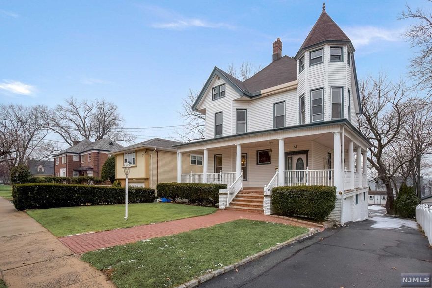 Here is your opportunity to bring this massive 8 bedroom 3.5 bath home back to its former glory. Sitting on a large 50 x 186 foot lot the potential is endless. Main home has grand entrance living room, dining room, kitchen and 1/2 bath on first floor. 2nd floor has 4 bedrooms and full bath. Walk up attic with full bath and 2 bedrooms and storage area. Basement is an extended family unit with a separate entrance to the living room kitchen, 2 bedrooms and full bath.