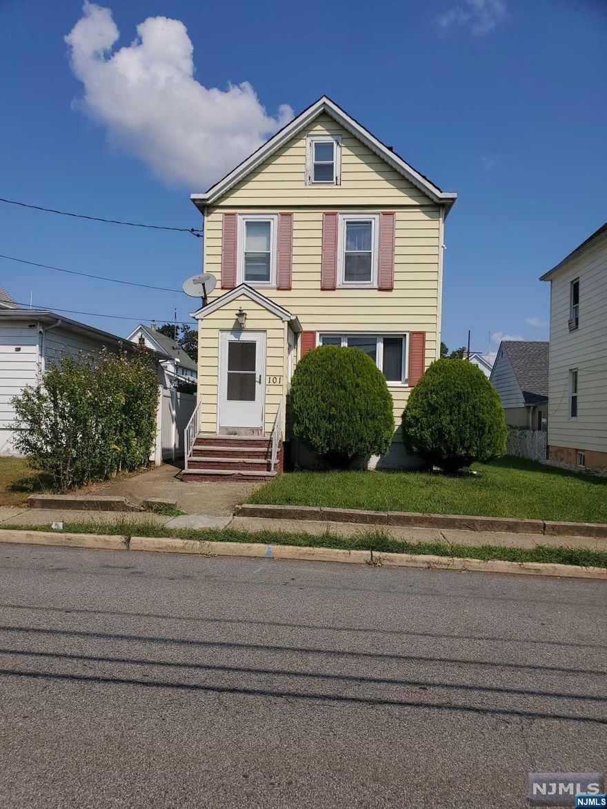 Great 1 family home Nice size kitchen 2 baths parking for 2 cars in rear , property sale is as is condition.