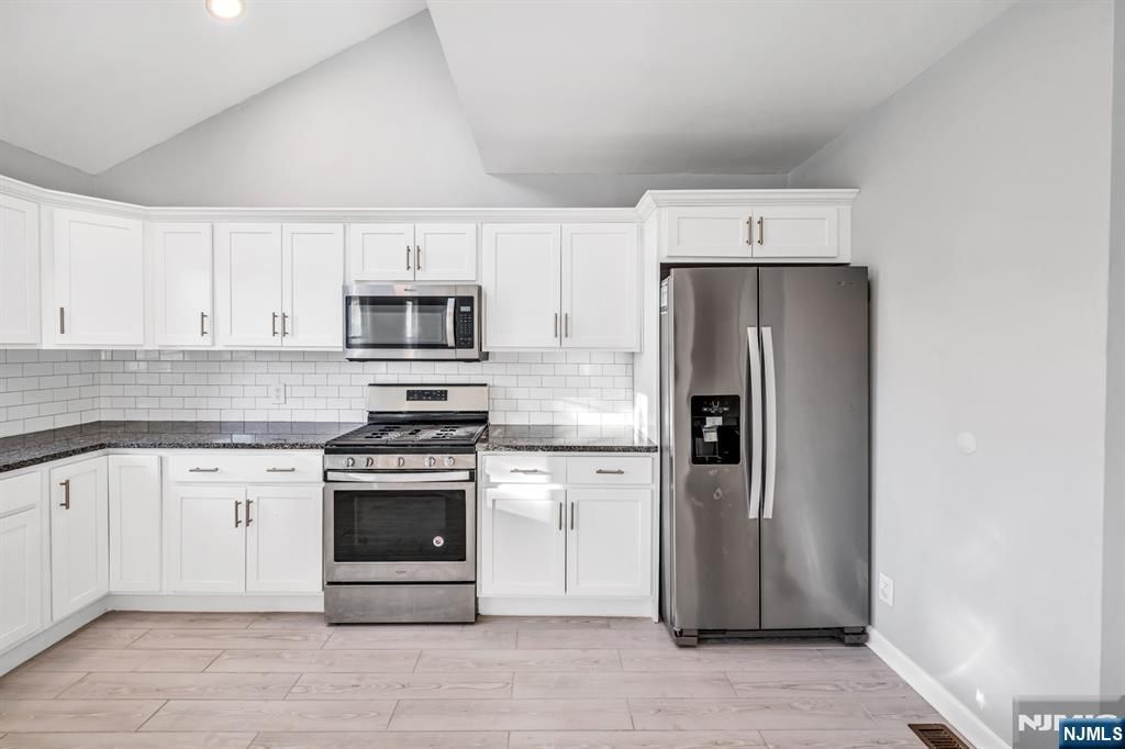 Photo of 911 Liberty Avenue, North Bergen, NJ 07047 (MLS # 26014948)