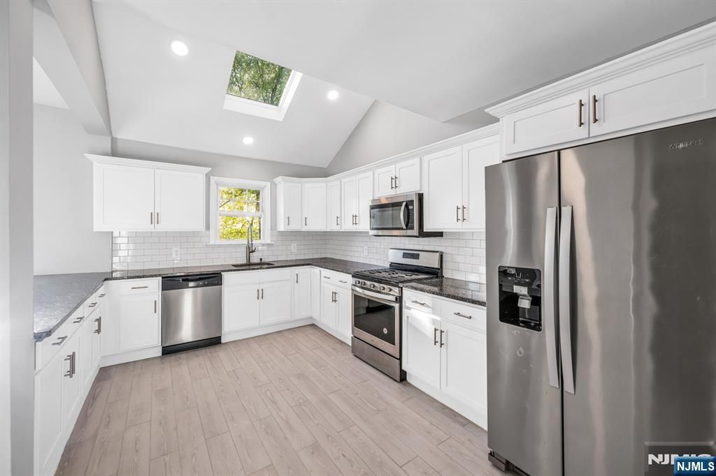 Photo of 911 Liberty Avenue, North Bergen, NJ 07047 (MLS # 26014948)