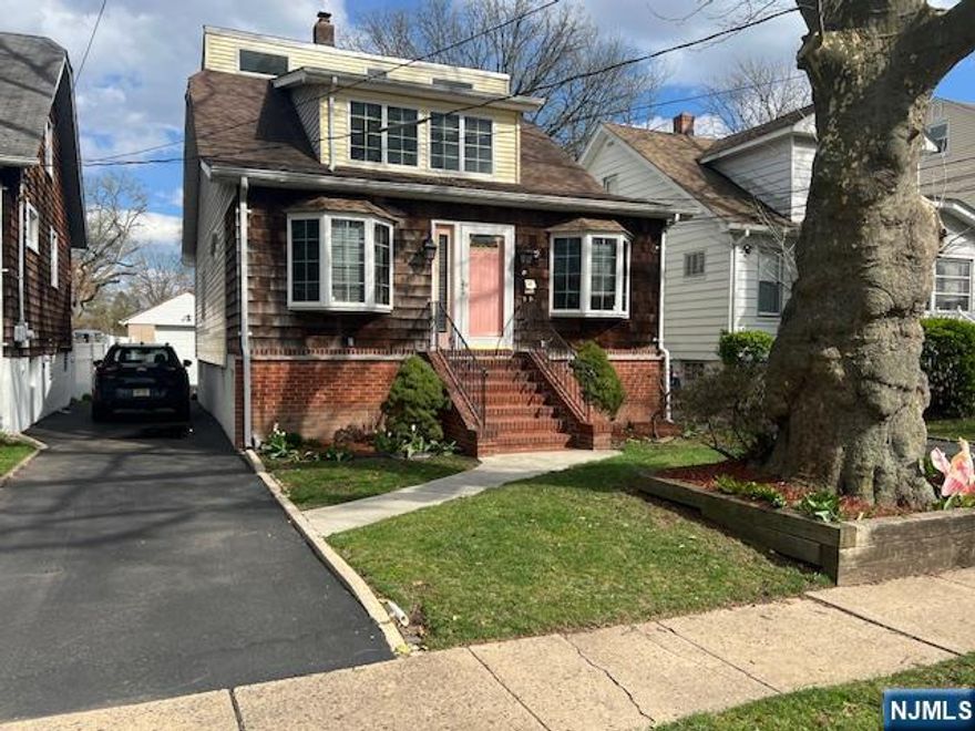 Spacious 4 Bedroom, 2 Full bath home located in desirable Springfield. First floor features a large living room, dining room, large eat-in-kitchen, and bedroom. Second floor has 3 generously sized bedrooms. Fully finished basement provides additional living space and a built in sauna along with utilities washer/dryer, and an additional stove with easy access to the back yard. Enjoy a large outdoor area, perfect for entertaining complete with a Two-level Trex deck and tiki hut bar. Home is conveniently located near shipping, dining, major highways and public transportation.