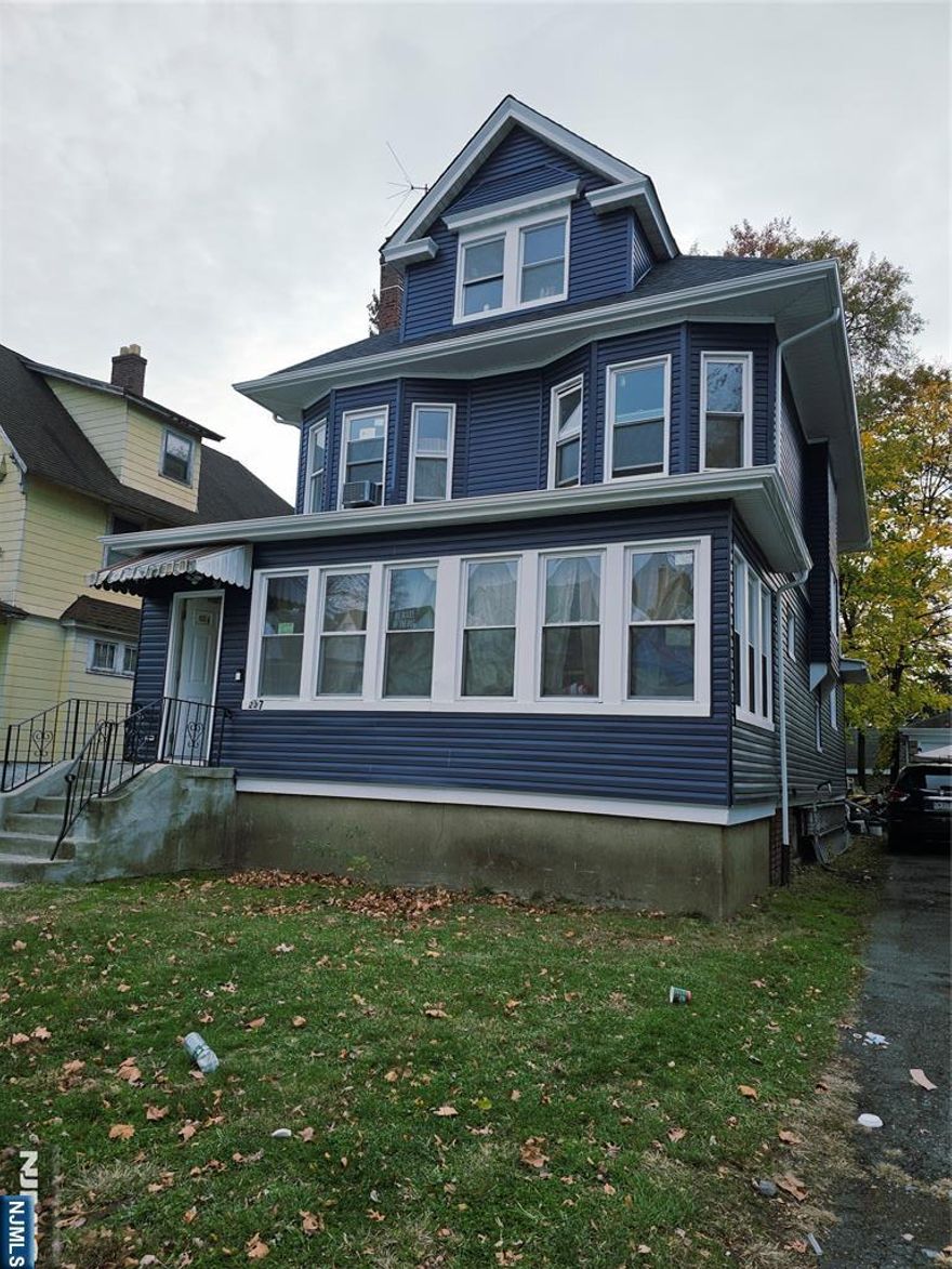 Instant Cash Flow Awaits You! This spacious 5-Bedroom Victorian-Colonial in East Orange, NJ is a true cash-cow opportunity offering income potential from day one or a perfect home for buyers seeking space, character, and long-term value. Featuring a generous layout with an eat-in kitchen, formal dining room, living room, enclosed front porch, finished basement, and 4 full baths, this home delivers both size and versatility. A large private driveway provides ample off-street parking, a rare find in the area. Currently occupied with tenants, creating strong income potential. **Property is being sold AS-IS. Buyer is to perform all due diligence. Buyer is responsible for all town inspections and certs.** Whether you're looking for steady cash flow, a property with long-term upside, or a buyer ready to make this spacious home your own, this property offers endless possibilities. This 5-Bedroom Victorian-Colonial is a cash cow so churn it up, because you're about to make C.R.E.A.M.