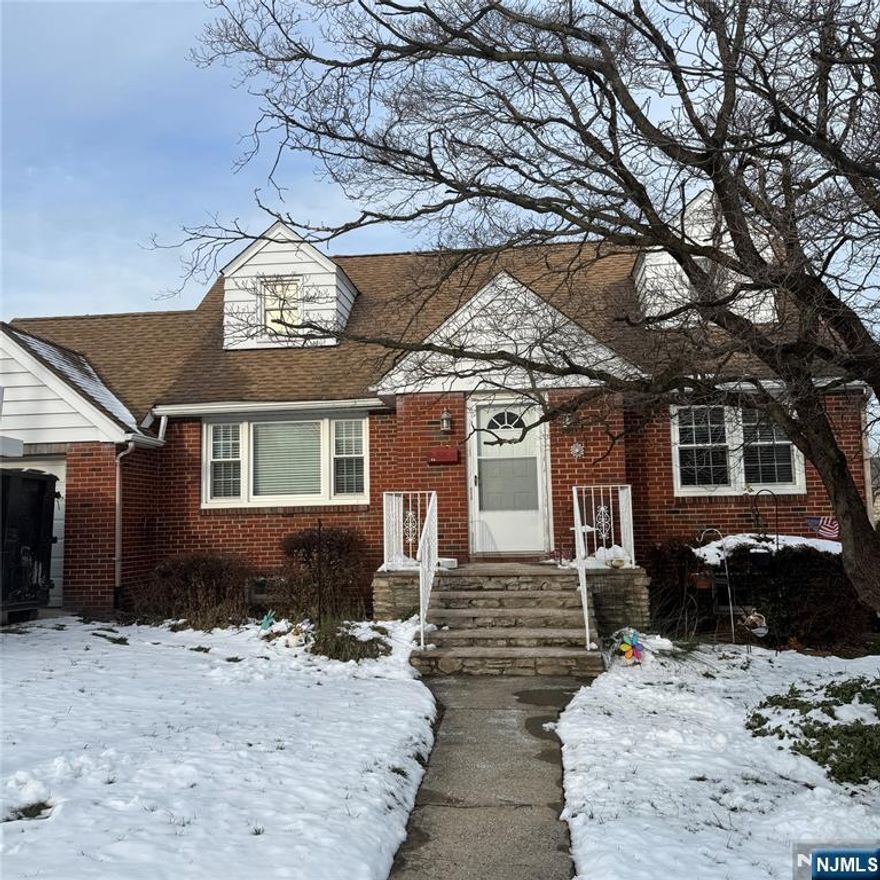 Welcome to this charming 3-bedroom home located in the heart of Clifton! This inviting residence offers a thoughtful layout with two bedrooms and a full bath on the main level, perfect for convenient everyday living. The sun-filled living room flows into an eat-in kitchen, providing a comfortable space for gatherings and meals at home. The second floor features a private third bedroom. The semi-finished basement adds valuable bonus space for a recreation room, gym, or additional storage. Step outside to enjoy a nicely sized yard, perfect for relaxing or entertaining. Conveniently located close to schools, shopping, parks, and NYC transportation, this home offers both comfort and accessibility. A wonderful opportunity to own in a desirable Clifton neighborhood!