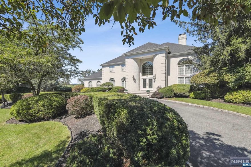 Experience an enchanting residence located on .59 acres. This thoughtfully designed home offers a well-appointed layout, featuring a bedroom & full bath, living rm, dining rm, eat-in kitchen, family rm, den, laundry rm, powder rm, & convenient 3-car garage entrance on the first level. Built in 1994, this Colonial Contemporary-style property seamlessly blends modern sophistication with timeless architectural elements.The meticulously maintained interior exudes warmth & elegance, providing an inviting space for relaxation & entertainment. The second level boasts 4 more bedrms, including an oversized primary suite & main bath, along with a third bathrm. Full finished lower level offers a recreation rm with a wet bar, a separate full kitchen with a 5-burner gas stove, refrigerator, & dishwasher, full bath, workrm, utility rm, & plenty of closets for storage.Outside, the home features brick siding & stone, complemented by an expansive deck that enhances outdr living.