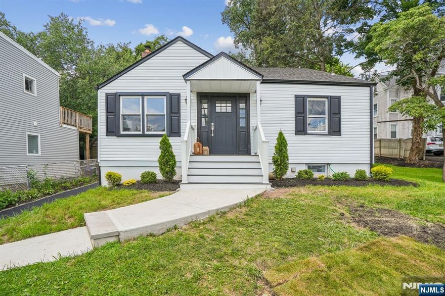 This completely renovated Cape Cod is the epitome of bright and modern! Bright sun streams in the windows to reveal a large and gracious living room connected to an open concept Kitchen, Dining Room and Family Room perfect for entertaining. The brand new kitchen features custom cabinetry, quartz countertops, stainless steel appliances, gas range/oven, and a spacious island that overlooks a wall of windows onto the sparkling pool and oversized lot. The Family room has a gas fireplace for relaxing. Freshly refinished floors throughout the house leads to two airy bedrooms with ample closet spaces and a clean, modern design bathroom. Upstairs is the spacious primary suite with a walk-in closet, sleek bathroom and a space perfect for a home office or calm sitting area. Full basement and laundry room. Just blocks from Eagle Rock Reservation and Montclair's vibrant shopping and dining scene, this home combines comfort, style and location. Welcome home!