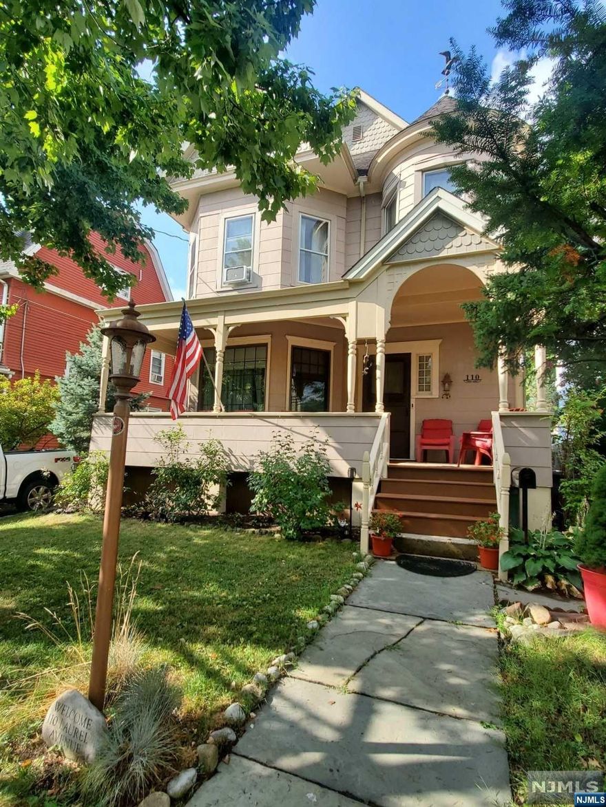 One of a kind, spectacular 1905 Queen Anne Victorian home. Wood flooring and wood trim throughout. Original pocket doors in the living room and dining room. Both with ample space to entertain. Woodburning fireplace in the dining room. Super large bedrooms with plenty of closet space. Lovely front porch to enjoy the breeze. Large backyard with storage shed. Large storage room in basement. One car garage and five car driveway. Lovely tree-lined street. Express and local buses on the corner. A quick hop to the PATH and railroad. Close to schools.