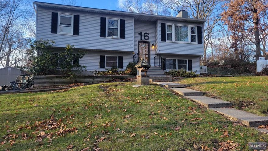 This 4 Bedroom Bilevel contains a recently remodeled kitchen, with granite counter tops. A brand new whole house generator, new carpeting, wood burning stove, new well water holding tank, and new hot water heater. Updated half bath. Recently paved driveway with plenty of parking, for when you are entertaining guests on the large deck. Split duct combo for heat and Air conditioning. Brand new leaf guards help to make maintenance a breeze. Two storage sheds in the back yard.