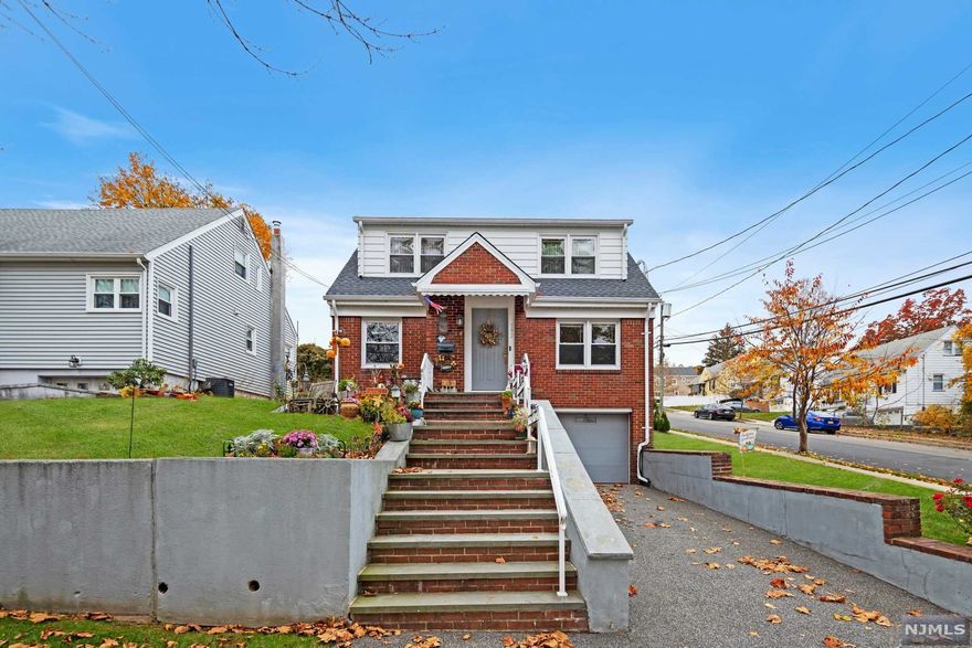 Beautifully maintained two=family in fabulous location overlooking Albion Park! First floor unit boasts hardwood floors throughout, very spacious and sun filled combination kitchen/dining area with sliders to patio/yard, two bedrooms, spotless bathroom and access basement/attached garage with finished family room/office/guest room with outside access. Second floor apartment boasts living room, two bedrooms, eat-in kitchen and bonus sun room (pot'l conversion to 3rd BR. Excellent condition throughout, all newer separate utilities, new roof, newer shed, ductless A/C throughout.