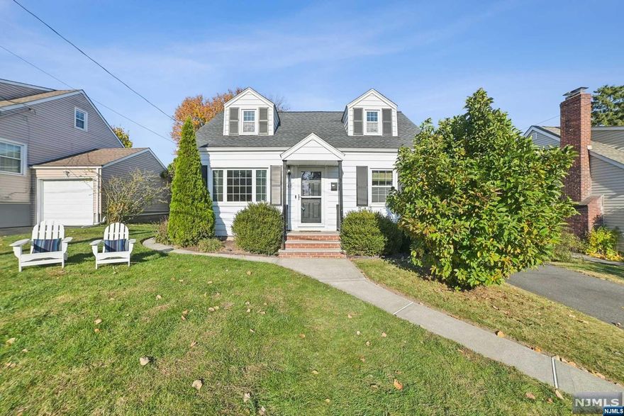 Tie a bow around this one! This updated 4-bedroom, 2-bath cape has hardwood floors, a modern eat-in kitchen with stainless appliances, newer windows, and central air! It has been freshly painted for that crisp move-in feel. This home features a one-car attached garage and a large fenced-in backyard. The 192 bus stop is up the street, and the Allwood Park and Ride is only 10 minutes away. Welcome Home!