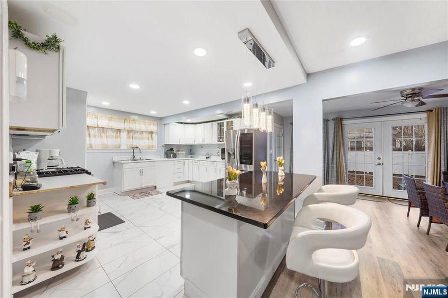 Welcome to contemporary living in the heart of Weequahic! This outstanding single-family home has been renovated throughout. Featuring a spacious and functional layout with three generous bedrooms and three-and-a-half bathrooms, an elegant and stylish kitchen with an island that is perfect for entertaining. This residence is designed for comfortable living and has ample space for gatherings. Located in a vibrant community near historic Weequahic Park with easy access to major commuter routes I-78, Route 22, and the Garden State Parkway. Just minutes from Liberty International Airport. Don't miss this rare opportunity to own a move-in ready masterpiece!