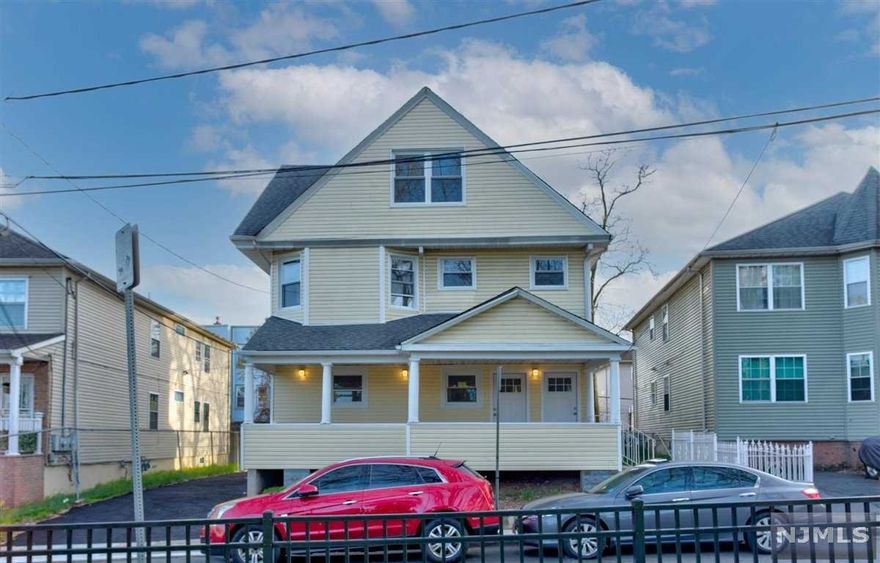 A renovated 2-family property that you will surely love. This property boasts a beautiful wooden flooring and walls painted with grey and white accent for a neat and clean ambiance. Spacious kitchen and living areas. Don't miss this opportunity to make this house your new home.