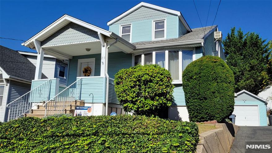 Exceptional, move in condition 2 Family home in the Roosevelt School district. This home contains 2 bedrooms on each floor and a partially finished basement. All utilities are separate and a long driveway and detached garage complete the package. Priced to sell this spring. See it today!!