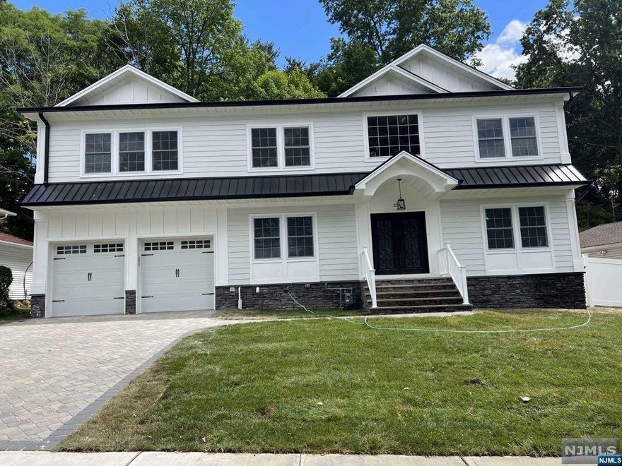 Stunning NEW CONSTRUCTION ON EXISTING FOUNDATION & NEW CONSTRUCTION NEW FOUNDATION! located in the highly Reputable town of River Edge. This Beautiful built colonial offers five bedrooms, 4 full baths & two half baths in a lot of living space with a lot of natural lights! The first level offers nine foot ceilings entry foyer, a gourmet kitchen with beautiful finishes full dining room, guest suite, great room and living room with fireplace, mudroom Second level offers a master suite with his and hers walk-in closets and spa-like bathroom, two junior suites, two additional good size bedrooms, Jack & Jill bathroom & laundry room. Full finished basement with 8ft.height ceilings, and Wet bar. Outside Features include Hardy Plank siding With Azeri Panel, custom cast iron door. Close to major highways, NYC transportation & the beautiful Van Saun Park Don't let a home like this pass you by! Photos are similar finishes, not actual photos of the home. Home will be ready for February 15