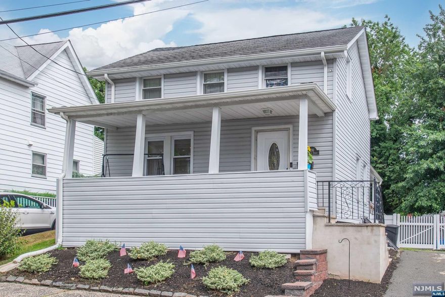 Amazing opportunity and move-in ready all located in desirable Nutley Township. Wonderful opportunity to own a home! Why rent? Home features: Move-in condition with updated kitchen and bathrooms. Newer kitchen (renovated approx. 2017) with quartz counters, stainless steel appliances, and a pantry. Large living and dining room with recessed lighting. Powder room and convenient first floor laundry. Second floor includes: two bedrooms and a renovated full bathroom. Gleaming hardwood floors throughout, lots of natural light, and newer windows. Beautifully maintained with all newer and updated mechanics in the last 3-4 years: roof, heat, AC, and hot water heater. Enjoy outdoor living: beautiful level fenced in back yard, front porch, side porch and patio. Great location! Wonderful schools, minutes to downtown shopping, and incredible restaurants. Easy access to major highways, NYC, and nearby NJ Transit Train and buses. Perfect!