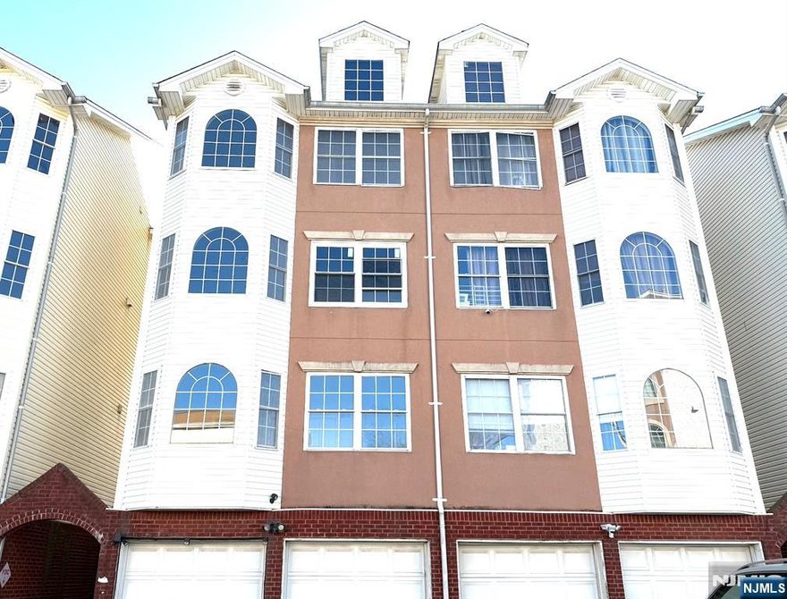 Donâ€™t miss this two-family home with incredible potential! Located in a gated complex in Elizabeth this property features spacious units, an attached 2 car garage, and plenty of room for customization. Each unit offers 3 beds 2 baths, along with comfortable living and dining areas. The home requires some repairs, making it a perfect opportunity for someone with the right vision to bring this property to it's full potential.