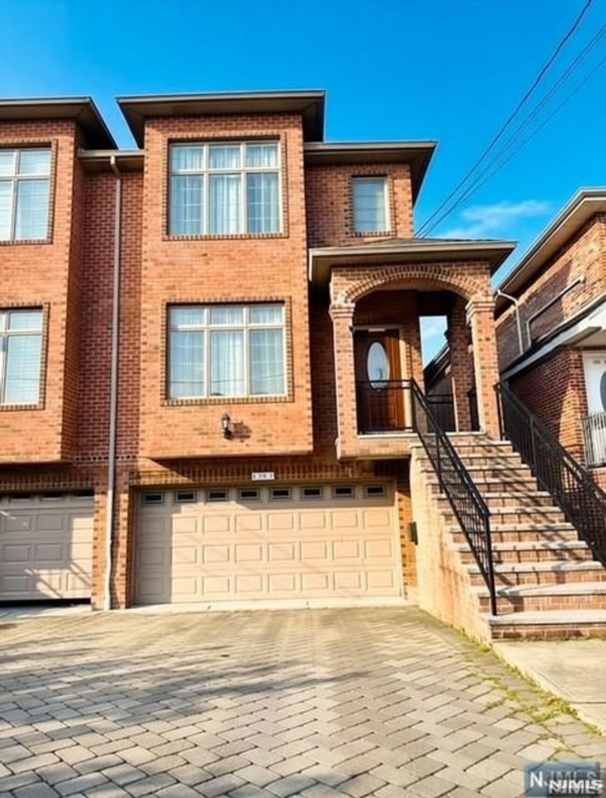 Bring your belongings and move right into this bright southwest facing fully furnished OVER-SIZED DUPLEX home! Conveniently located on the Columbia Ave with easy access to all major highways and minutes walking to public transportation to NYC. Quite street yet very close to the center of the town. Spacious living room, dining room and family room with fireplace invites you and your family to this warm home where you can rest and recharge. Crown moldings and hardwood floors throughout with sliding door to the deck for entertaining and BBQ. Modern eat-in kitchen with stainless steel appliance. Powder room on the first floor. Double door leads to the second-floor master suite which is equipped with Jacuzzi and shower. Two bedrooms, full bath and laundry/dryer on the second floor. Plenty of closet and storage space. 3 zone heat, 2 zone AC, central vac. Ground floor one bedroom one bath. Two car garage with outside parking space. Come and live to enjoy this loving home!