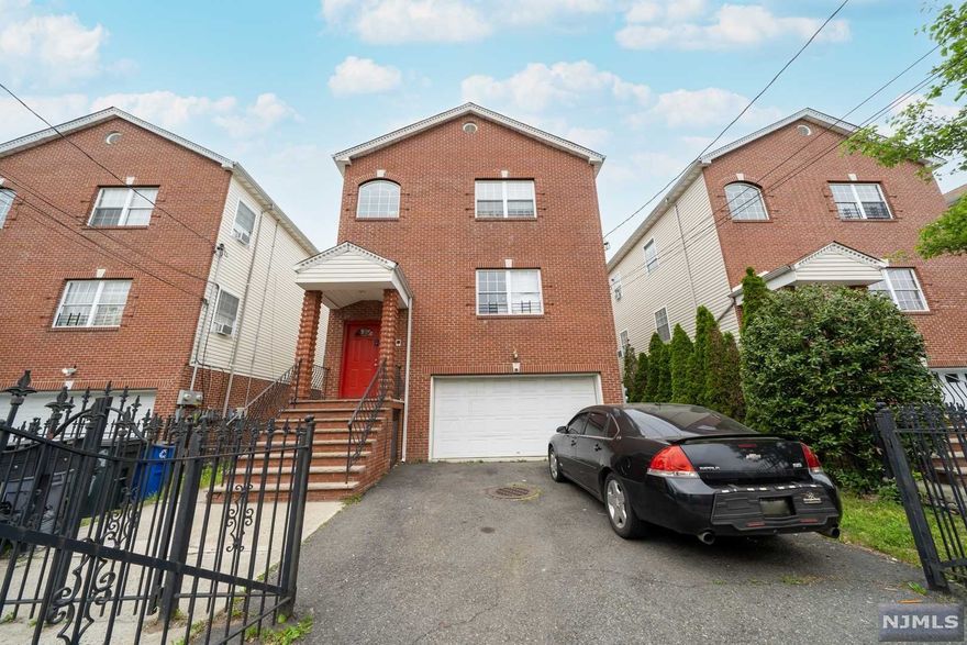 Here is your chance to own a 2 family, income producing property newly constructed in 2006. Unit 1 is a 3 bedroom, 2.5 bath duplex apartment. Unit 2 is a 3 bedroom 2 bath apartment, both units are well appointed, tenant occupied. Each unit also has HVAC and rear facing balcony for outdoor enjoyment. Ample backyard space with well manicured lawn for family gatherings and entertaining. Easy bus access to NYC, major highways like I78, GSP, Route 21 and close to Badger Ave Park. New development projects next to the property are signs of an ever growing robust community that's great for living and investing.