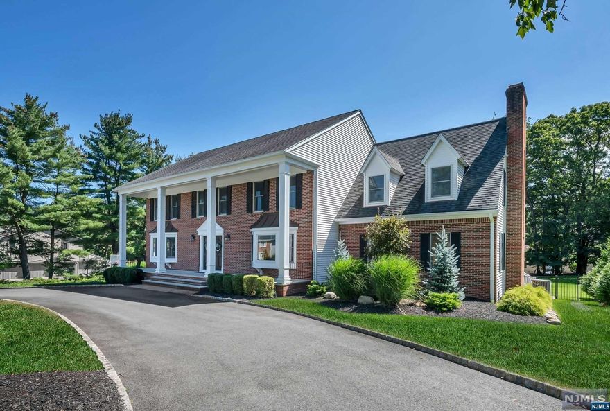 Experience suburban bliss at 507 Hampton Hill, a 5 bed, 4 bth classic colonial in the prestigious Lily Pond Estates of Franklin Lakes. This residence seamlessly blends contemporary updates with classic charm, offering an exceptional living experience. The heart of the house, an updated kitchen, serves as a culinary haven and the social epicenter. With an open layout that seamlessly flows into the family room, this space is perfect for entertaining. Large glass doors open onto the expansive deck, inviting the beauty of the outdoors in, and revealing a sprawling backyard, perfect for relaxation, outdoor dining, and play. A private office checks the box for all who work from home! The Owner's Suite offers a tranquil and luxurious ambiance, complemented by its sparkling new bathroom. The finished LL offers rec space for media, exercise and more. An extensive list of upgrades, both indoors and outdoors, has transformed this residence into a turnkey masterpiece, a rare opportunity!