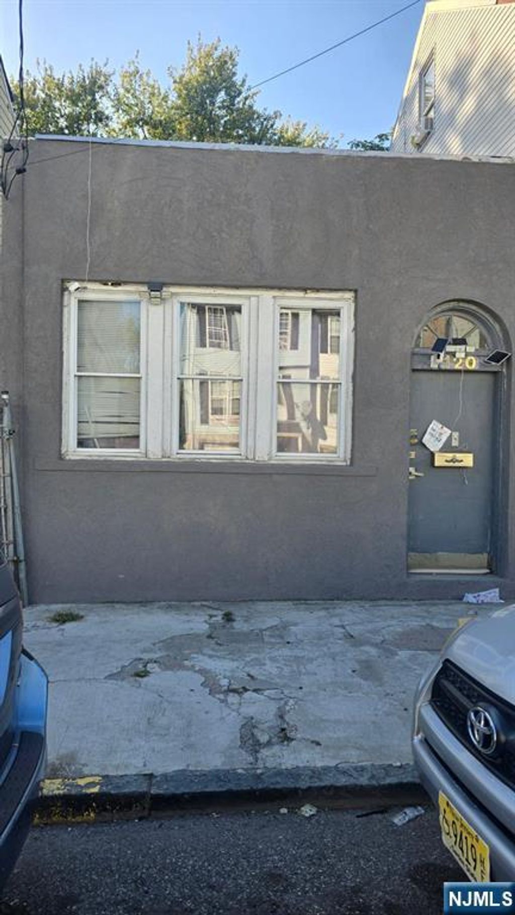 Photo of 120 Madison Street, Paterson, NJ 07501 (MLS # 25035299)