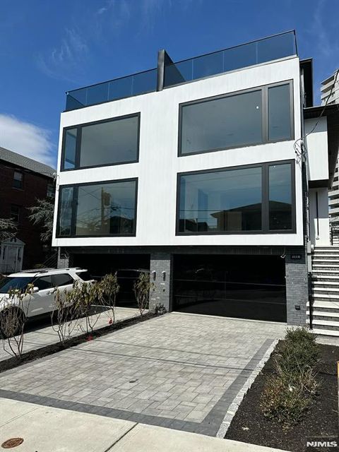 Photo of 411 Jane St, Fort Lee, NJ 07024 (MLS # 26010705)