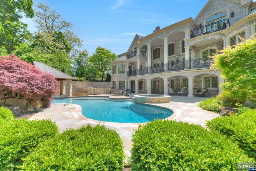 An unrivaled custom built all brick manor executed by renowned Bergen County builder was completed in 2013.Set upon picturesque one acre parcel and encompassing over 11,000sf.No expense was spared or detail overlooked in the design and construction of this spectacular estate.Enter trough an impressive entry and immediately get embraced by gorgeous interiors.Dramatic Entry Foyer with bridal staircase with custom wrought iron design opens up to 2 story Great Rm w/FPL & wall of windows overlooking meticulously groomed private, fenced grounds.2story Living Room,Dining Rm with adjacent wet bar.Cherry wood library,Beautiful Salerno kitchen with breakfast room.Second floor offers beautiful primary suite & 3 en-suite quarters. Magnificent walkout lower level include a theatre, Fam.Rm, spa bath/sauna GYM, summer kitchen.Outdoors one will find 3 tiers of amenities!A raised terrace off the main level, gunite pool with pool house and bar.Radiant heat on 3 levels,5 car garage, pavers and more