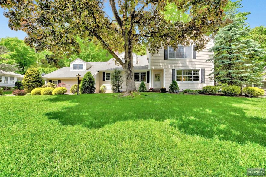 Welcome to this custom built home in the beautiful Knolls section of Wyckoff.Located on one of the most desirable streets in town. This four bedroom, three bathroom Colonial offers a wonderful floor plan, perfect for entertaining and everyday life. Living room with fireplace, beautifully updated kitchen with granite countertops.Large vaulted ceiling master bedroom with beautiful master bathroom. Very close to NYC express bus, schools, recreation center and downtown shopping.Beautiful level lot.