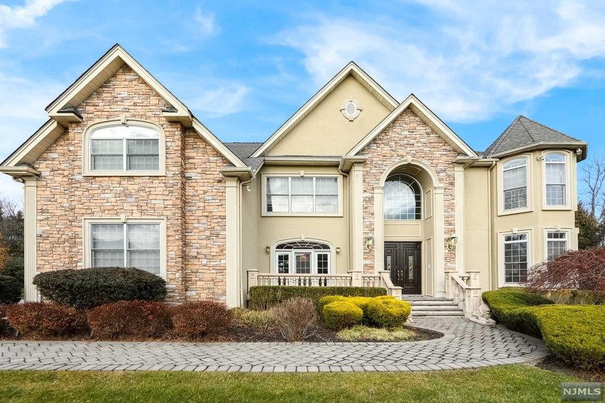 BEAUTIFUL HOME BUILT IN 2004 ON ONE OF THE MOST SOUGHT-AFTER STREETS IN ALL OF OLD TAPPAN, BERGEN COUNTY. MANY HIGH-END FEATURES INCLUDE: INTERCOM SYSTEM, OUTDOOR SPEAKERS, OUTDOOR LANDSCAPE LIGHTS, BACK UP GENERATOR, DOWNDRAFT VENT(KITCHEN), HEATED GARAGE, TILED GARAGE, LYNX BBQ, SURVEILLANCE SYSTEM AND FIRST FLOOR SURROUND SYSTEM. STUNNING OUTDOOR OASIS HAS A HEATED GUNITE POOL WITH WATERFALLS AND A CONNECTED HOT TUB. TWO STORY ENTRANCE FOYER WELCOMES YOU INTO THE HOME WITH AN OPEN FLOOR PLAN. FORMAL DINING AREA AND LARGE MODERN EAT-IN KITCHEN WITH TOP-OF-THE-LINE STAINLESS STEEL APPLIANCES, DOUBLE OVEN, AND WINE CHILLER. FAMILY ROOM HAS FLOOR TO CEILING WINDOWS WITH BRIGHT NATURAL LIGHTING. SECOND FLOOR IS COMPLETE WITH THREE BEDROOMS (GYM RM), AND THE MASTER SUITE. TWO WALK-IN CLOSETS & A SPA LIKE MASTER BATH. FULL UNFINISHED BASEMENT WITH GREAT POTENTIAL. NOT TO MENTION, BLUE RIBBON SCHOOLS AND CLOSE PROX. TO ALL NYC TRANSPORTATION AND SCHOOLS!