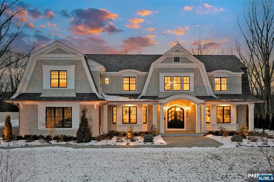 Once in a Lifetime...A Modern Marvel...Be the first to own this newly built 6 Bedroom 7.5 Bath Ridgewood Estate that entices w/ a Hamptons flair. An idyllic setting on coveted Knollwood Rd in the "old country club" section. Where homes of this extraordinary caliber rarely come to market. Elevated tranquility awaits, situated on a bucolic 2-AC. Step into a world of style & luxury designed by pedigreed architect Jordan Rosenberg. Offering 8000+- sq ft of modern luxury living on 3 levels. Boasting a popular center hall floor-plan w/ grand sized rooms. An inviting 2 story EF, lavish chevron, mahogany flooring, soaring 14ft. ceilings & abundantly positioned new windows create luminous refined openness. This perfect setting embraces our Modern lifestyle.The chef's kitchen extraordinaire, is equipped w/ designer cabinetry hi end appliances; Wolf, Thermador, Miele-72-in fridge! A 10-ft Calcutta marble waterfall peninsula, 2 sinks & Thermador espresso station. A custom wall of entertainment w/ warm burning fireplace is ideal for relaxing w/ seamless access to the Veranda. Where the home transforms into a private resort. Boasting 2 summer kitchens, salt-water Pool, cabana; 2 pergolas et al. Notable: Primary Bedroom; 2 ensuite luxury full baths, 2 WIC, espresso/wet bar. LL:Movie theatre, Wine cellar. 3 car heated garage. A Generac generator! Enjoy Premier top ranked Public Schools. Hassle free commute to NYC via Train! Contact Angela Cuciniello for details 201.657-6084. Don't Miss out!