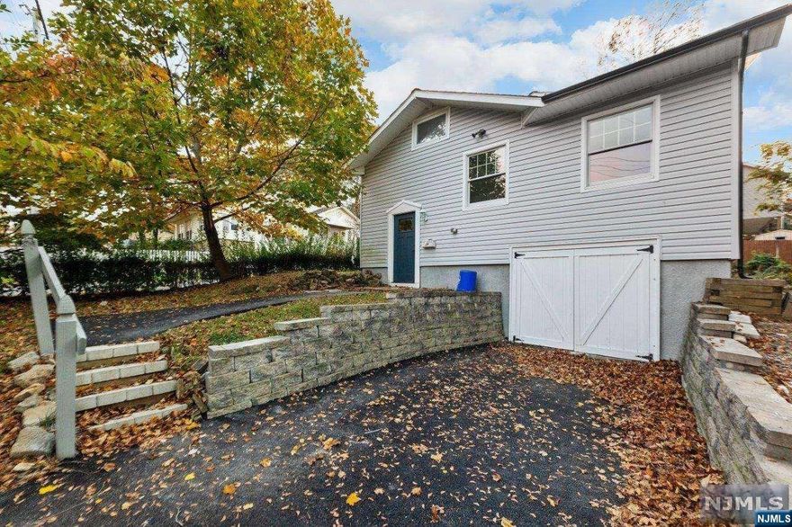 WOW! Gorgeous Colonial located in the heart of Budd Lake. Come see this beautiful 3 bedroom, 2 bath home. First floor welcomes you with spacious bedroom, main luxe bath, living room featuring an open layout with new floor, recessed lights & a crisp neutral palette throughout, easy to customize! Kitchen including quartz countertops, SS appliances, formal living room and dining room. Second level features 2 generous bedroom & luxurious Bath. Sizable Backyard offers plenty of space to build + play, and entertain. PLUS garage! City water & sewer, central a/c included. A Beauty! Don't miss out on this opportunity to own this spectacular home! A really MUST SEE! Come see yourself!