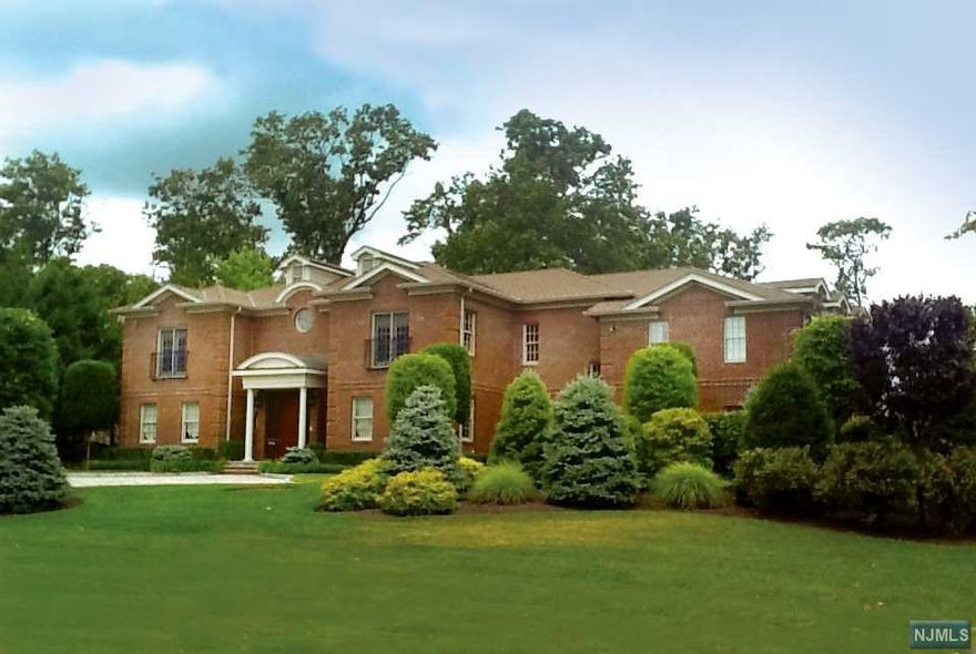 TASTEFULLY & ELEGANTLY DECORATED 5 BRS, 5 FULL & 1 HALF BATH BRICK COLONIAL ON BEAUTIFULLY LANDCSAPED LOT. LARGE LIVING ROOM & FORMAL DINING ROOM, STEP-DOWN GREAT ROOM WITH FIREPLACE/BUILTINS/COFFERED CEILINGS,OFFICE WITH DOMED CEILINGS OVERLOOKING PROPERTY, MAGNIFICENT WHITE KITCHEN WITH VIKING APPLIANCES, SUB-ZERO REFRIGERATOR, MINI FRIDGE, 2 BOSCH DISHWASHERS BRICK MARBLE BACKSPLASH & BLACK GRANITE COUNTERS, HUGE BUTLERS PANTRY. LARGE MASTER BEDROOM SUITE WITH 3 WALKIN CLOSETS & FIREPLACE. SECONDARY STAIRCASE, MANY FRENCH DOORS THROUGHOUT. 10 FOOT CEILINGS ON 1ST FLOOR, 9 FOOT CEILINGS ON SECOND FLOOR & 9 FEET IN UNFINISHED BASEMENT. SURROUND SOUND & CENTRAL VAC. TRULY SPECTACULAR!