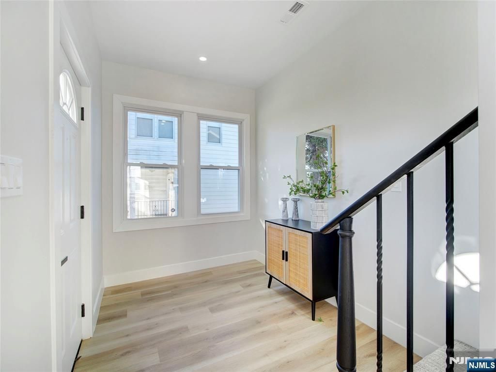 Photo of 5 Krotik Place, Irvington, NJ 07111 (MLS # 26000353)