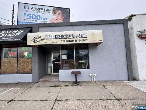 Photo of 687691 Main Street, Hackensack, NJ 07601 (MLS # 26011476)