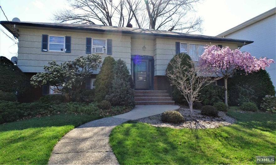 Large Two Family offers oversized 4+ car garage with 10x10 garage doors can be ideal for trucks. Renovated ground level apartment has two Bdrms, 2 Full BAs, Eat-in-Kitchen, Dining Rm, Living Rm and laundry closet. 2nd Fl apartment has 3 Bdrms, 1 Full BA, Kitchen, Dining Rm, Large Living Rm, Laundry Closet, and access to Deck. Newer HtWtrHt, Multi-Zone gas heat, separate electric, thermal windows 1st grd flr apt, fenced in dog pen, storage shed and more! Located in residential Athenia section. A MUST SEE!