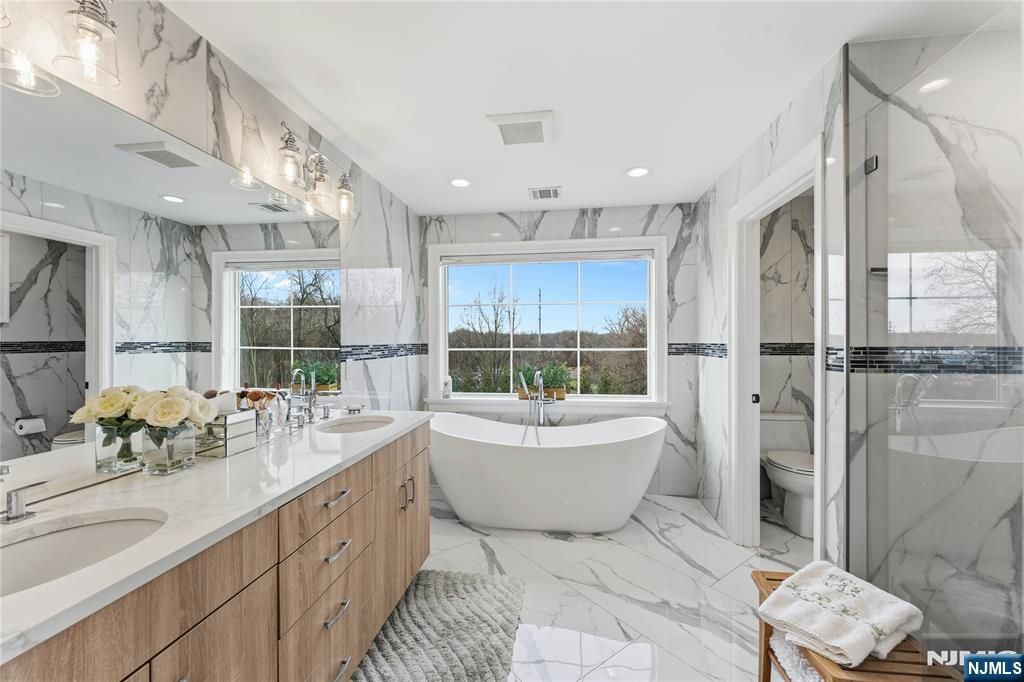 Photo of 281 Beaufort Avenue, Livingston, NJ 07039 (MLS # 26008003)