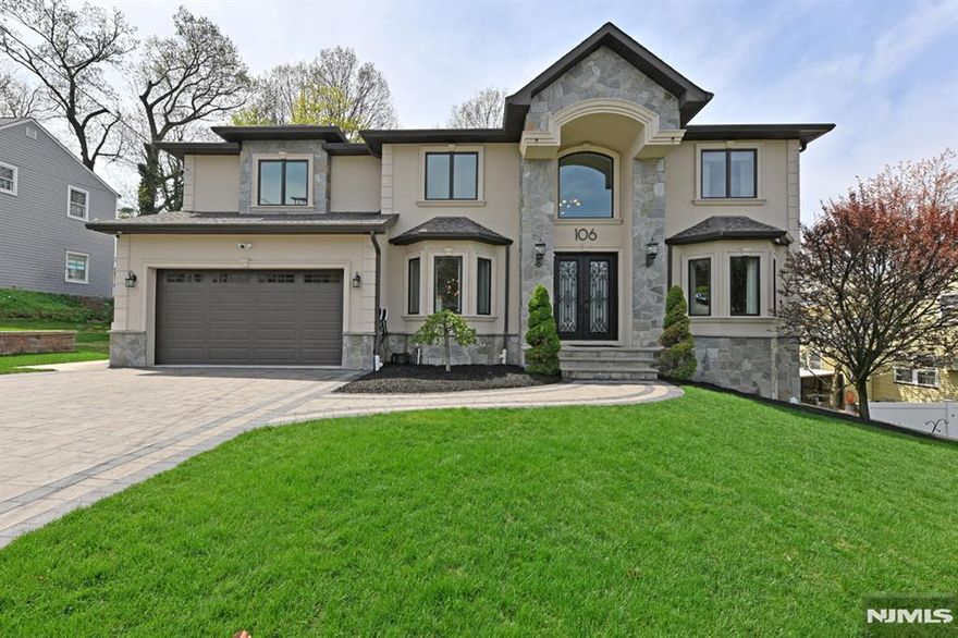 Welcome to this sophisticated, 10-year-young Colonial, where timeless design meets modern luxury in prime Paramus. A grand cast iron door opens to a dramatic 2-story entry foyer. The 1st flr features a formal living room & dining room, a stunning 2-story family room w/ gas fireplace. A 1st-floor bedroom w full bath offers flexibility for guests or extended living. The stylish, modern kitchen is designed for everyday living & entertaining w/ sliders out to the patio. A thoughtfully designed second level has: Jr. suite w/ full bath, 2 more ample bedrooms, a full bath, and convenient laundry. The primary suite has a luxurious bath & two walk-ins. The landing w/ view to the family room enhances the open, airy feel. A finished walkout basement offers an impressive extension of living space, complete with full-size windows, vinyl plank flooring, and additional full bathâ€”ideal for recreation or entertaining. Lots of upgrades, including central vac, 3-zone A/C, sprinkler system, generator, solar panels and 2-car garage. Outside, enjoy a beautifully landscaped yard with a paver driveway and dual EV charging stations. Your private backyard oasis awaits, w/ a heated saltwater pool, serene zen fountain, an outdoor kitchen w/ seating, and a covered patioâ€”perfect for relaxing or hosting unforgettable gatherings. All of this a stoneâ€™s throw from a Blue Ribbon Award-winning elementary school, makes this exceptional home a rare opportunity you wonâ€™t want to miss.