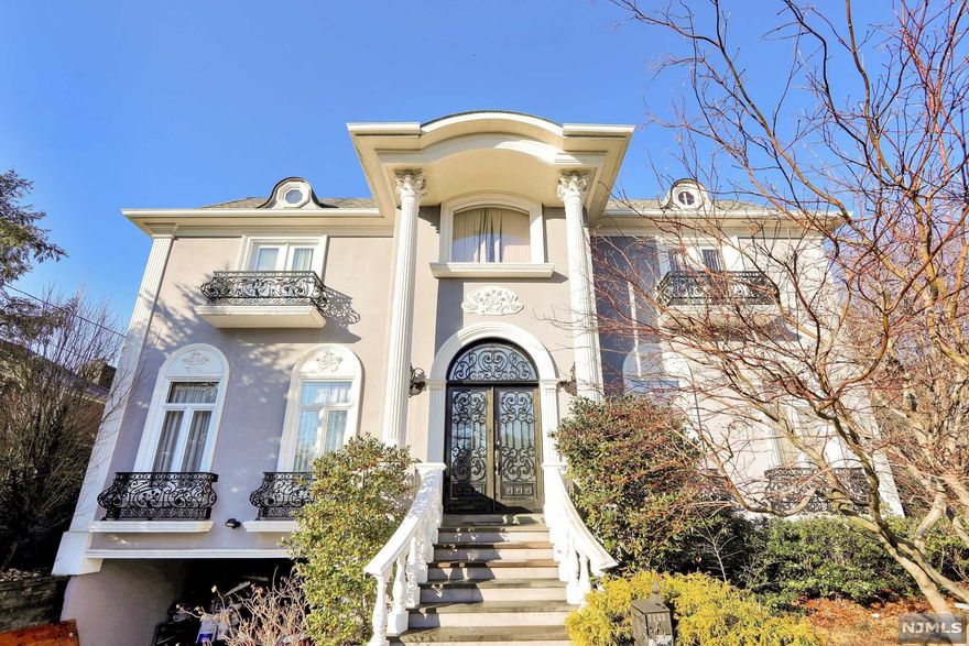 Opportunity Knocks!!! Estate sale. This magnificent custom design European palace is waiting for a lucky buyer! Be ready to be amazed!!! 1st floor has 24' center hall ceiling, formal LR, DR, Card Rm, Gallery designed baroque details, modern mixture kitchen with cream gold cabinets, high end appliances, inlay ceramic floor and backsplash, radiant floor heating throughout. 2nd floor has 14' ceiling master suite with sitting rm, master bath with steam sauna and jetted tub, and library, another bedroom/office, Jack and Jill bath. Only 3 steps up, 3rd floor has 2 more large bedroom suites with full baths and balconies and living rm. This fabulous house has 6 zone air conditioning, full house generator, elevator, 3 fire places and much more...