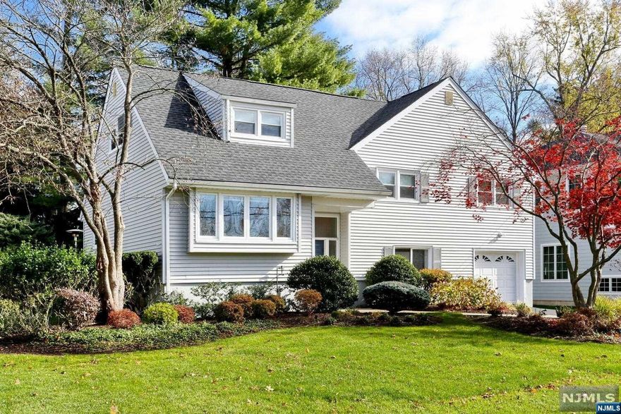 Look no further! Tucked into one of the most coveted neighborhoods in Glen Rock is this lovingly maintained 4 bedroom home. Starting with the beautifully landscaped property leading to a welcoming entry foyer. Off this is a spacious office/den complete with custom cabinetry and recessed lighting. The ground level continues with an updated half bath and laundry room leading to the back yard. There is also a garage entrance and access to the lower level basement with abundant storage and potential for another office/rec room. Head upstairs to the main level where a generous sized living room opens to the dining room. A renovated eat in kitchen features custom cabinetry with ample storage, granite counters, and tumbled marble backsplash. The 2nd level features the primary bedroom with full bath, 2 more bedrooms and another full bath. The 3rd level has yet another bedroom. The lush and private property boasts an oversized deck overlooking the yard.16 Yardley Court is not to be missed!