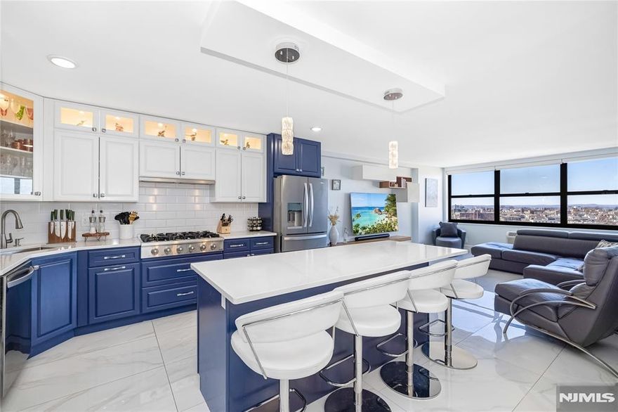 Experience upscale living in this expansive 1,337 sq. ft. condo located in Guttenberg, NJ. This beautifully remodeled 2-bedroom, 2-bathroom residence offers sweeping river views from every room, creating a peaceful and impressive backdrop for daily living. The thoughtfully designed open layout is ideal for both relaxing and entertaining, featuring a fully renovated kitchen with a large center island perfect for hosting. Refined finishes, enhance the homeâ€™s elegant feel, while the primary bedroom features a spacious walk-in closet and the secondary bedroom offers ample storage. Residents enjoy resort-style amenities, including indoor and outdoor pools, modern fitness centers, a full-service spa, tennis and pickleball courts, game and play rooms, and a resident lounge with stunning NYC views ideal for private events. A tranquil garden and on-site shopping mall add ease and comfort to daily life. This is a rare opportunity to own in one of Guttenbergâ€™s most sought-after buildings. Galaxy Towers offers all-inclusive utilities, optional parking, 24-hour concierge and security, and convenient access to Manhattan via bus or ferry, delivering a lifestyle that seamlessly blends luxury, comfort, and accessibility.