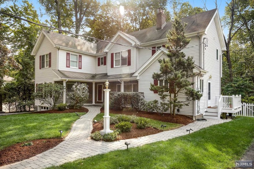 Tucked at the end of a cul-de-sac, this 20yr young Colonial is truly a warm & inviting home and is move-in ready! Features an open, front porch, tranquil yard and Primary Bedroom Suite with Cathedral ceilings, Skylights, large Walk-in Closet as well as a luxurious Primary Full Bath are only a few highlights of this magnificent home! Home offers 4 Bedrooms + 3 Full Baths with one of the bedrooms and full bath on the main level which makes this extended house plan very accommodating for guests. Finished Basement has endless possibilities to make it customizable to make it your very own! 1-car garage! Home rebuilt in '01 with many updates! Great top notch schools! Ramsey offers a great downtown area to dine and shop too! Easy transportation to NYC as well. Come see this one!