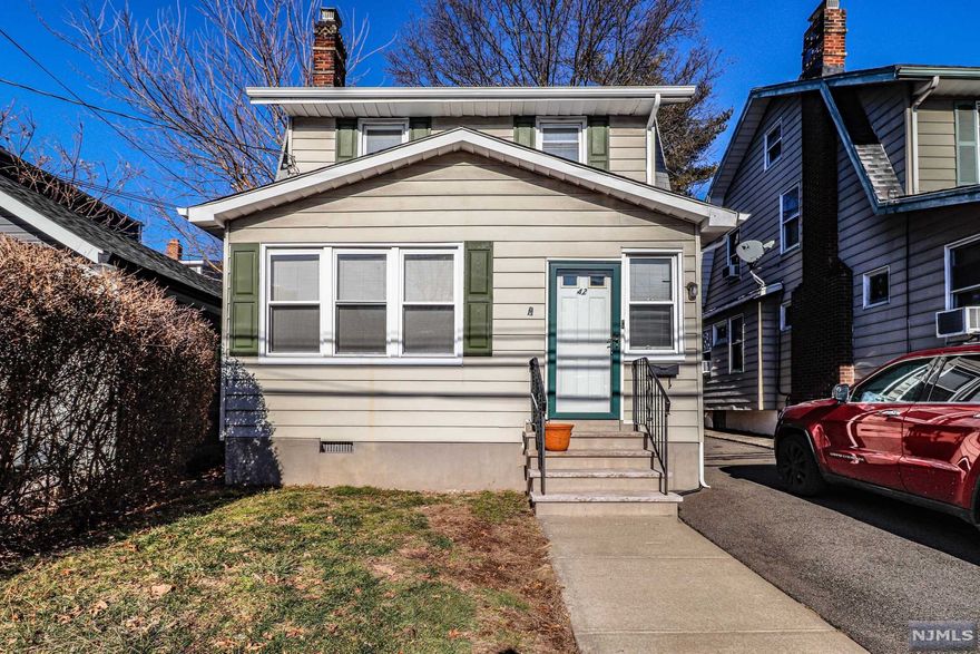 WELCOME TO 42 QUABECK AVE. NOTHING TO DO BUT MOVE IN! THIS LOVELY HOME FEATURES 3 BEDROOMS 2 FULL BATHS. HARDWOOD FLOOR AND NEWER WINDOWS. FINISHED ATTIC AND BASEMENT. NEW FURNACE AND HOTWATER HEATER. DRIVEWAY AND SHED. HILLSIDE BOARDER. CLOSE TO GAREDEN STATE PARKWAT, TURNPIKE, BUS STOP.