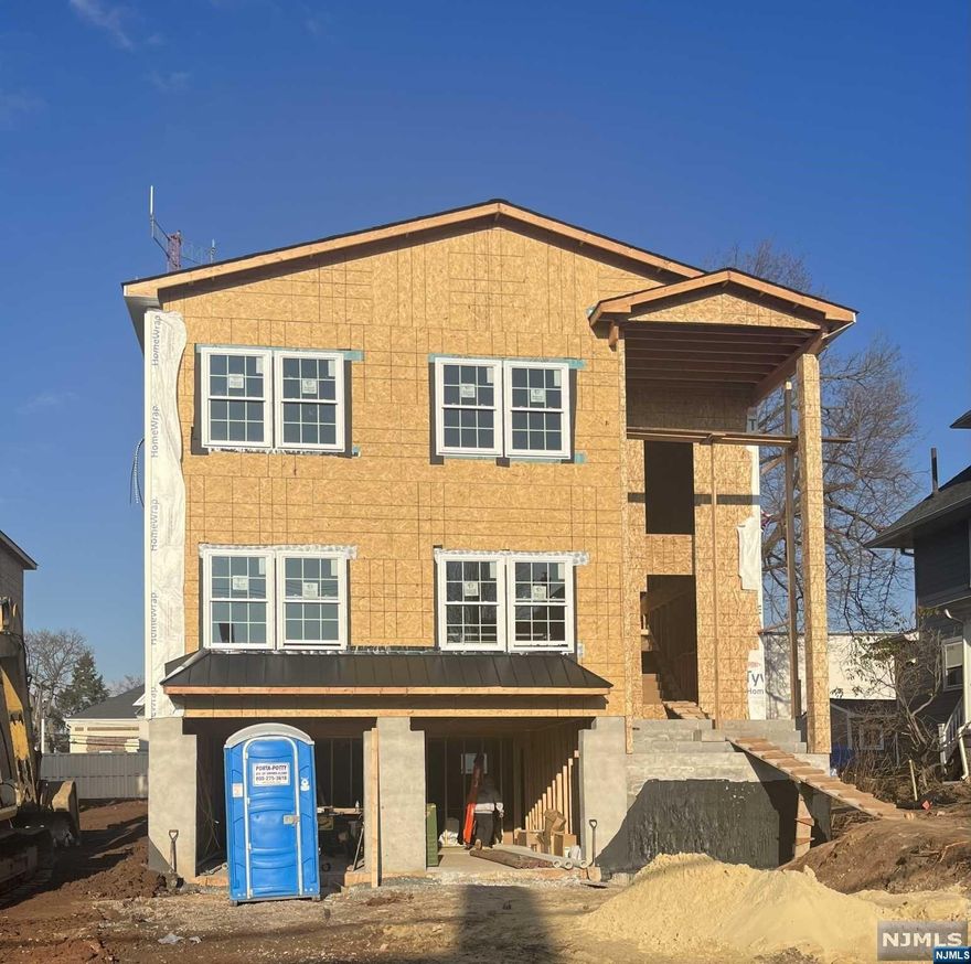 Brand NEW CONSTRUCTION, 5 Bedroom 4 1/2 Bath Colonial in the sought after town of Hasbrouck Heights, Quality Construction consisting of New Foundation, Finished Basement with Wet Bar and 1/2 Bath and 2 car garage. First Floor features Livingroom, Family Room with Fireplace, Diningroom, Modern Kitchen w SS Appliances and Quartz Countertops with Sliding Door to patio and private yard and a FIRST FLOOR GUEST BEDROOM AND FULL BATH. Second Floor features Master Bedroom Suite with Fireplace 2 Walk in Closets and Full Master Bath, 1 Additional En-Suite Bedroom with Full Bath and 2 Additional Bedrooms and Full Hall Bath and Laundry Room. Hardwood Floors throughout, 2 zone Central Air and Heat. Numerous Upgrades to list. 1/2 Block to NYC Transportation and Blvd Shops and Restaurants (Interior Photos are from a previous new construction by the same builder)