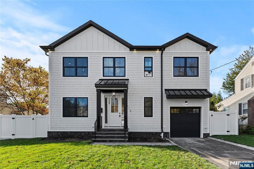 Welcome to 215 Kensington, where a "Feng Shui" of harmony, balance, and beauty join forces. This 5 bedroom 6 Bath (4 Full 2 Half) masterpiece, displays vigor and subtle boldness in its craftsmanship. Avant Developers, One of Bergen County's Premiere builders, in conjunction with the Renowned Arizi Interior Designer demonstrate an earthy, minimalist approach, a true renaissance in interior planning and construction. Walking distance to Van San County Park. Schedule a showing today. Be the lucky one to call this home.