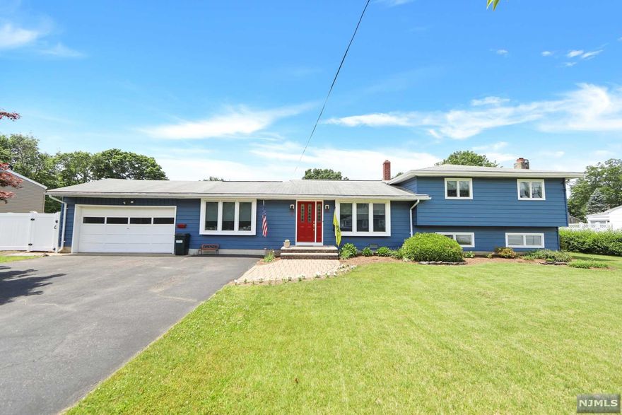 Welcome to this great split-level home. As you walk in, you will find yourself in a spacious living room with lots of natural light. The living room connects into a large dining room, perfect for entertaining. In addition, you will find a large eat in kitchen w/ granite counter tops and stainless steel appliances, an office area, and laundry room. As you head to the second floor you will find two bedrooms, an updated hall bathroom, and the primary bedroom w/ updated bathroom and walk in closet. The lower level of the home has an additional bedroom, a large & cozy family room w/wood burning fireplace, as well a half bathroom and utility room. The amazing backyard features a built-in swimming pool, a deck with pergola, a patio, a storage shed, and is fully fenced in. Additional features include hardwood floors on the first and second floors, central A/c, an oversized 2 car garage, and a large driveway for additional parking.