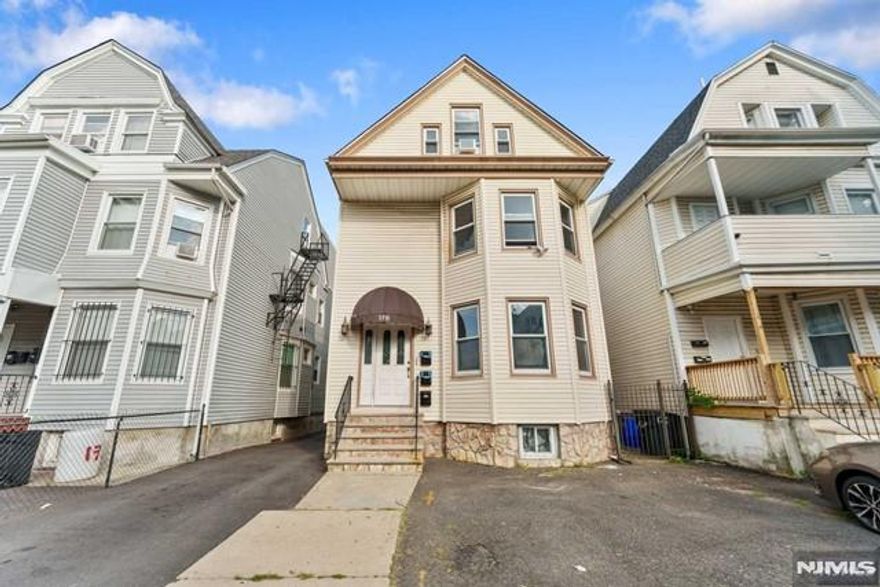 Welcome to your recently renovated 8-bedroom home, designed for modern living with convenience in mind. This stunning home includes two units (2nd floor unit has 2 levels) and features stainless steel appliances in the kitchen, providing a sleek and contemporary cooking experience. Freshly painted walls create a bright and inviting atmosphere throughout. Enjoy the ease of commuting with close proximity to NYC transportation and major highways, making your daily travels hassle-free. At the moment the home is fully occupied, but the 2nd floor 5 Bedroom unit will be delivered vacant at closing. The home includes the added benefit of off-street parking, ensuring a secure spot for your vehicle. Additionally, it has shared access to a charming backyard, perfect for relaxation or outdoor gatherings. This apartment combines stylish updates, practical amenities, and an ideal location for the ultimate living experience. Schedule an appointment today to see all that this home has to offer!