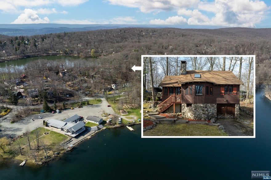 Nestled amongst mature trees, this classic cabin retreat is a stone's throw from lakeside lounging & outdoor activities galore! Step inside to discover the charm of wood floors and cathedral ceilings. Pause to admire the original details and natural finishes which evoke a sense of rustic elegance. The interior aesthetic is complemented by windows framing shimmering lake and forest vistas. This cabin offers all the amenities required for a full or part-time home including two bedrooms + loft, one bath and rough-in plumbing in the basement for laundry and an additional bath. A one-car basement / garage provides storage for outdoor gear, tools, or vehicles. The warmth of the central heating system ensures comfort during all seasons, while the fieldstone fireplace adds a cozy ambiance to the living space. This home is part of the private Highland Lakes Country Club. The Clubhouse and popular Community Beach 1 are located a short distance from the home.