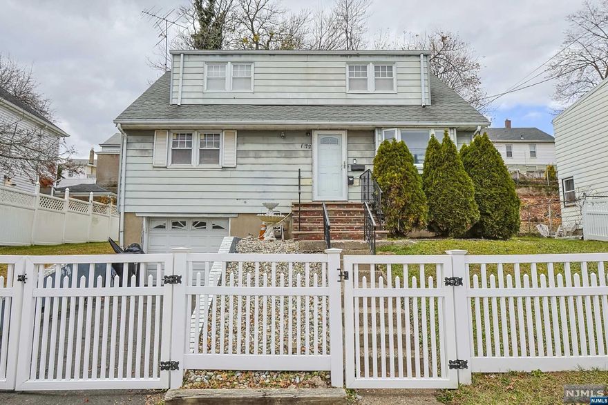 Located in the Eastside district of Paterson, this property is situated on a quiet street and offers a comfortable living space. The home is a two-story structure with four bedrooms and one bathroom. The first floor features a spacious living room with plenty of natural light, dining area, & a modern kitchen equipped with stainless steel appliances, and 2 of the 4 bedrooms. The bathroom is equipped with modern fixtures and features a shower/tub combo. The second floor of the home comprises of 2 well-sized bedrooms w/ ample closet space. The partially - finished basement has lots of room to be fully finished and space with additional plumbing for the makings of a second bathroom. The property also features a large backyard, w/ a new deck, perfect for outdoor activities and entertaining guests. This home is conveniently located near public transportation, major highways, schools and shopping.