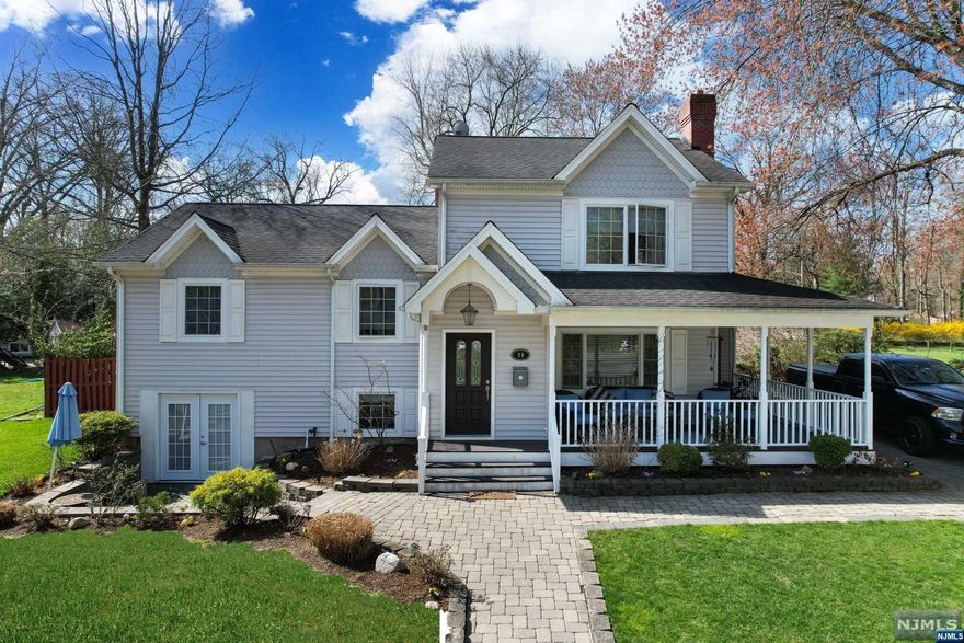 Welcome to this expanded enchanting home nestled in a wonderful quiet neighborhood just steps away from Schauble Park. This home has been meticulously maintained and offers tremendous curb appeal, spacious front porch, paver walkways, trex decking and well manicured landscaping. The main floor greets you with a vestibule entry that opens up into the spacious living room equipped with wood burning fireplace, eat-in kitchen, dining room and expanded mudroom with a private half bath powder room. This floor boasts hardwood floors, recessed lighting and open concept. The second level features 3 bedrooms and hallway bathroom. The newer expanded 3rd floor features an oversized primary bedroom with a generous walk in closet and private bathroom. Additionally, there is a finished basement with a bonus family room, laundry/utility room and french doors leading out to a ground level private patio.This endearing home is move-in ready, offers timeless style and charm!