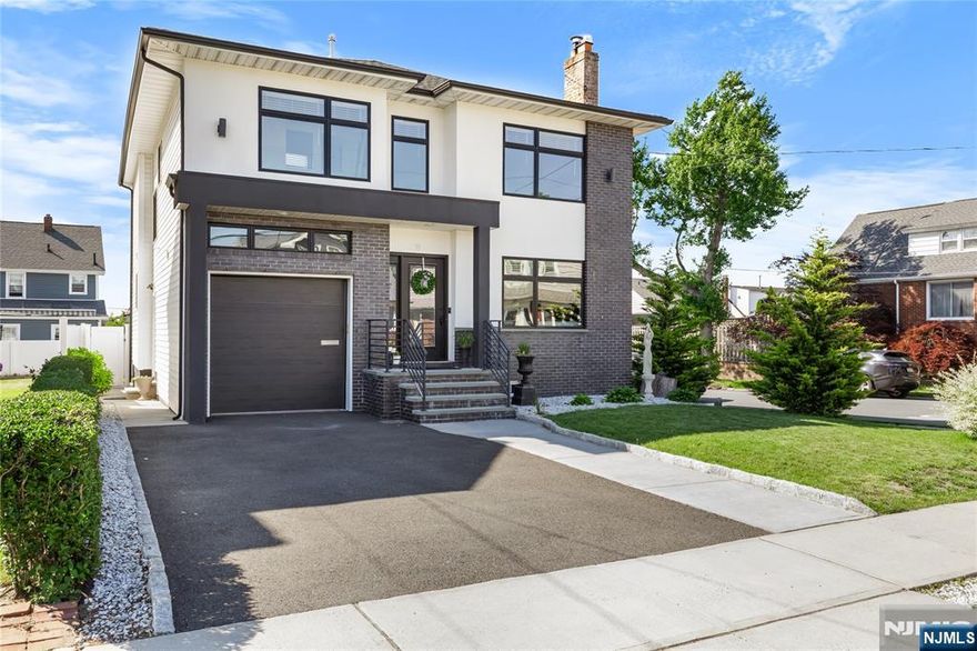 Newly constructed home over portion of original existing foundation in 2021- 5 bedroom, 3 bath home with built-in garage and driveway. Main level has spacious open concept living room, formal dining room, 1 bedroom or office with a full bathroom. Gorgeous kitchen with island & quartz tops with stainless appliances and tiled backsplash. The 2nd floor has a laundry room, 4 bedrooms, and 2 baths. Principal bedroom has a walk-in closet, full bath with rain head shower. Finished basement with tiled floors, recreation room, laundry room & storage. Closet organizers, hardwood floors, tiled baths, 2 separate gas HVAC heating and cooling systems, 200 amp electric. Private fenced-in yard. This prestigious home is located in a wonderful neighborhood, close to NYC transportation. Sellers hold a NJ Real Estate License.