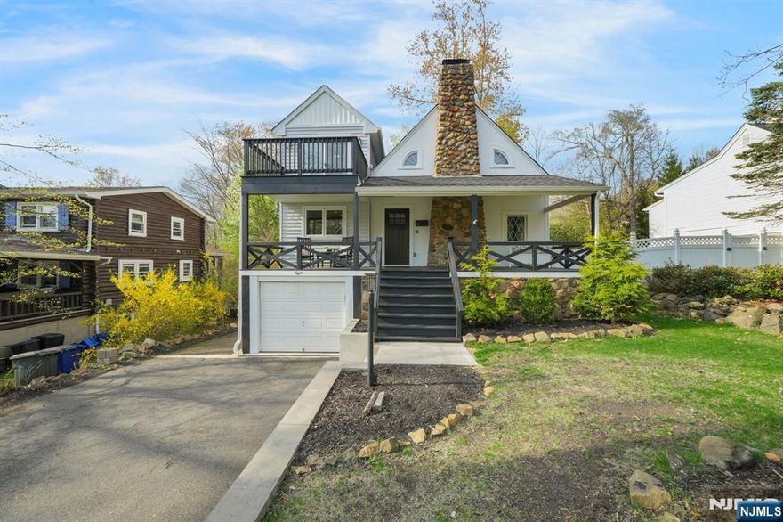 Welcome to this beautifully updated 2022 home in the Packanack Lake community of Wayne, New Jersey. This 4-bedroom, 2.5-bath home offers approx. 2,277 sq ft. The renovated kitchen features a quartz center island, stainless steel appliances, and 2023 GE refrigerator, washer, and dryer. It flows into the dining and living areas, creating an inviting layout. The first floor includes a primary bedroom suite with full bath. Bathrooms updated throughout. The living space is highlighted by a striking 2-story stone fireplace with recent code-compliant upgrades. The second floor offers three additional bedrooms, including one with designer finishes, a full bath with dual sinks, and balcony access. Seasonal lake views from front porch and second floor. Finished lower level offers flexible space for recreation, office, or gym, plus laundry, storage, and secure under-stair area. Smart features include Nest thermostats, Lutron lighting, Ring doorbell, and keyless entry. 2-car tandem garage, opener, Tesla EV charger. Rear deck and fenced yard. Short distance to Packanack Lake with beaches, clubhouse, golf, tennis, and events (fees vary). Close to parks, shopping, dining, highways, and NYC transportation.